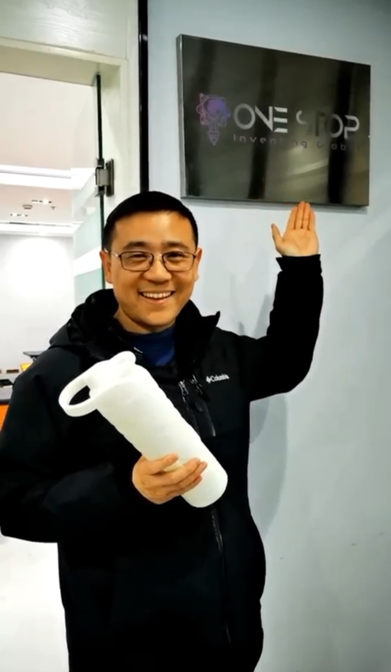 Team member presenting a 3D printed prototype