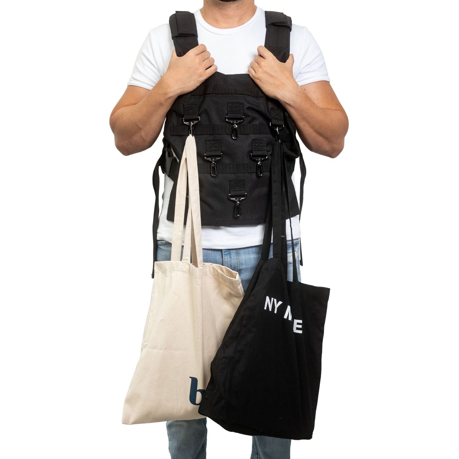 Man wearing the Grocery Vest, carrying several grocery bags hands-free